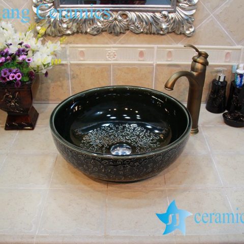 YL-OT_0648 Italian style shinny black glazed round hand carving wash basin