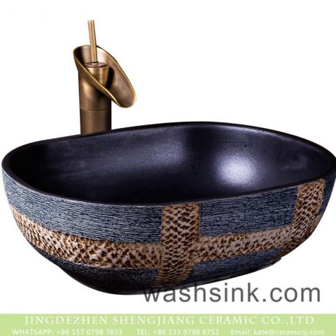 Hot sale European style oval art ceramic wash basin with beautiful designed and hand carved surface and black wall XXDD-19-3